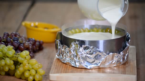 Step by step. Making mousse cake with grapes. — Stock Video