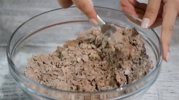 Cutting butter into flour to make Chocolate Pastry Dough — Stock Video