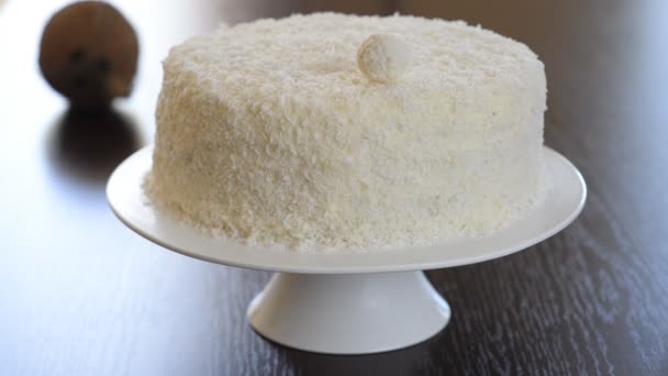 Coconut cake with coconut balls on top. — Stock Video