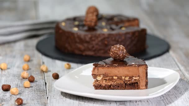 Piece of the French mousse cake with with chocolate glaze. Modern european cake pastry. — Stock Video