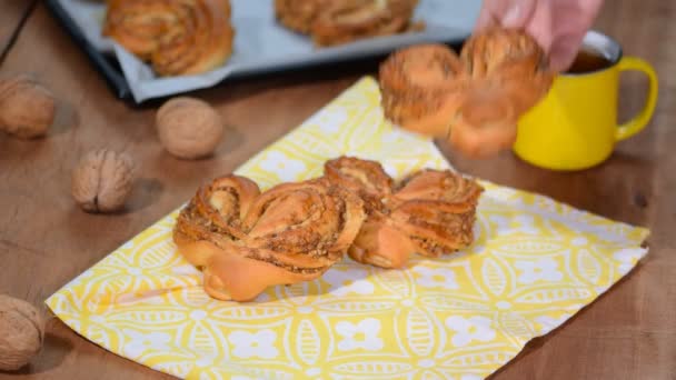 Buns in the form of heart with nuts filling — Stock Video