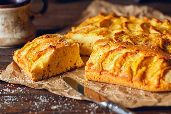 Homemade rustic apple pie on a wooden old vintage table. Dark ba — Stock Photo, Image