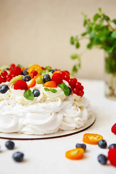 Pavlova cake with cream and fresh summer berries. Close up of Pa