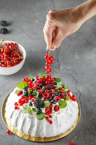 Pavlova cake with cream and fresh summer berries. Close up of Pa