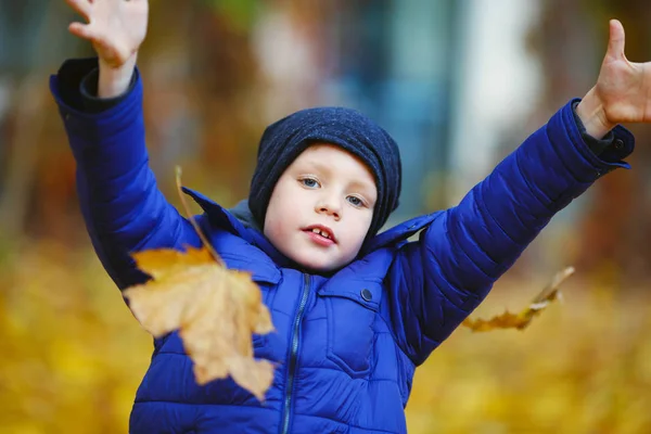 Portrait of happy joyful beautiful little boy outdoors at the au — Stock Photo, Image