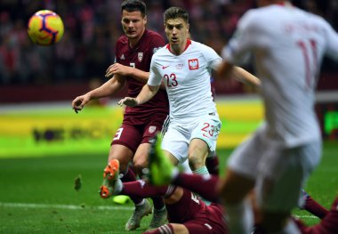Eylem sırasında Uefa Euro 2020 Marcis Oss (Letonya) Krzysztof PIATEK (Polonya) Polonya - Letonya 24 Mart 2019 yılında çizer, Varşova, Polonya Pge Ulusal Stadyumu Varşova Letonya ile 2:0 kazandı.