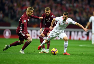 Arkadiusz Milik (Polonya) sırasında Uefa Euro 2020 berabere Polonya - 24 Mart 2019 yılında Letonya (Letonya) kilosunukopyaladık Tobers tarafından ele, Varşova, Polonya Pge Ulusal Stadyumu Varşova Letonya ile 2:0 kazandı.