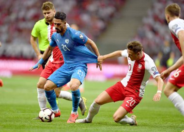 Varşova, Polonya, 10 Haziran 2019: Euro 2020 elemeleri, grup aşamasında, Polonya Pge Narodowy'de Izarel ile 4:0 kazandı. Mateusz Klich (Polonya) Beram Kayal (Izrael) Piotr Zielinski (Polonya)  