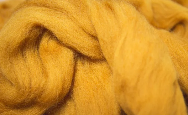 Texture of merino wool for felting close up. Handcraft material.