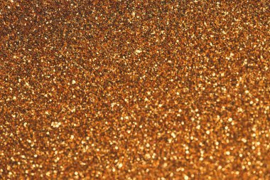 Abstract glittering background. Christmas or birthday backdrop. Party, holiday and festive concept. Invitation card theme. Selective focus