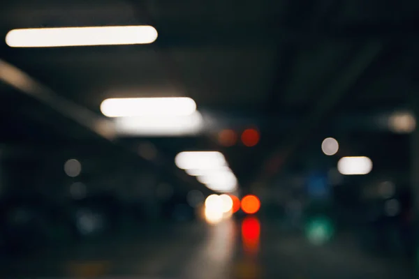 Abstract defocused background of colorful city lights at night. Blurry backdrop