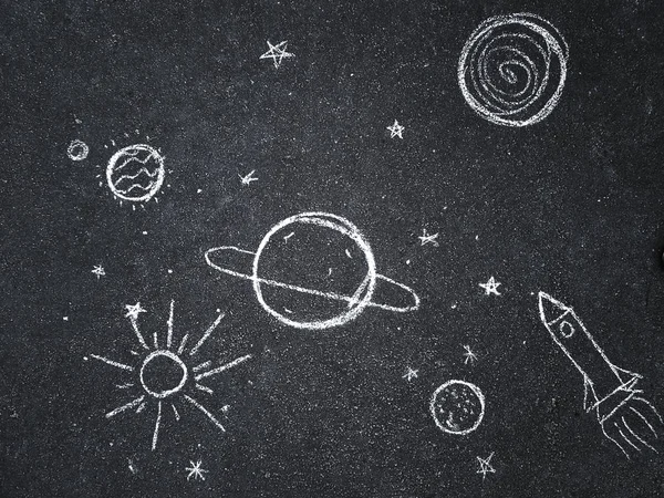 Kreidezeichnung. Raum, Planeten und Sterne von Kindern gemalt. — Stockfoto