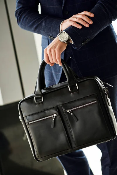 Businessman style. Men style. Young businessman with bag