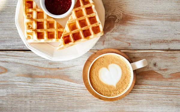 Belgian waffles with jam and Cappuccino coffee — Stock Photo, Image