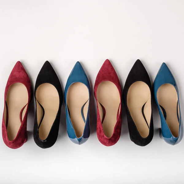 Footwear for women. High heels. Top view different colors of high heels. Fashion and beauty concept
