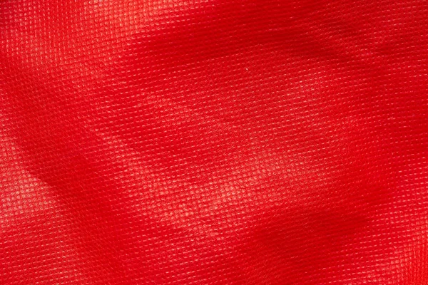 Vermelho não tecido tecido textura fundo — Fotografia de Stock