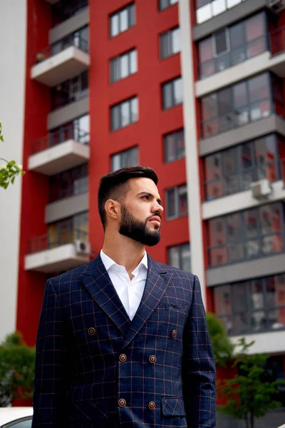 Businessman style. Men style. Man in custom tailored business suit posing outdoors