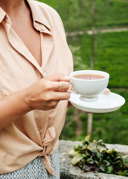 Woman with Drink Cup on Plantation Background — Stock Photo, Image