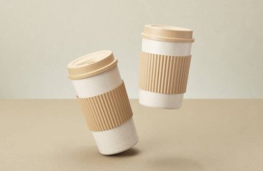 İki Eko Kahve Fincanı Bej Arka Plan izole