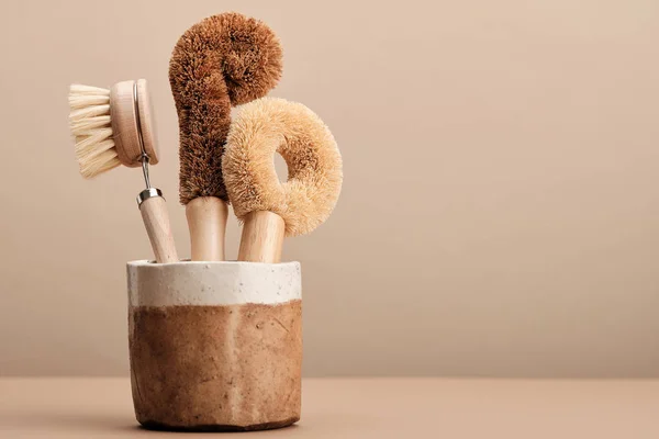 Kitchen Dish Brushes in Brown Ceramic Cup