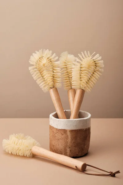Kitchen Dish Brushes in Brown Ceramic Cup