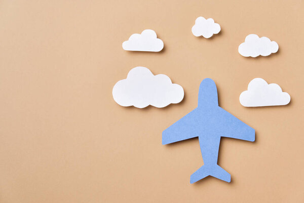 Handicraft from colorful paper Airplane and clouds