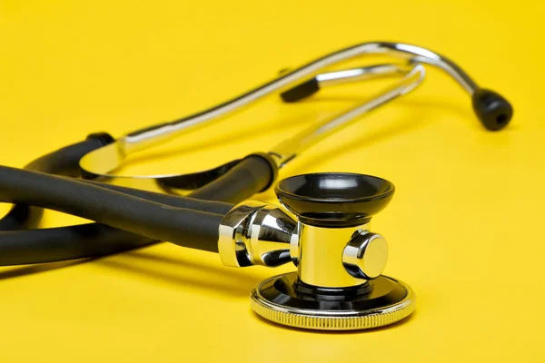 Stethoscope Close Isolated Yellow Background — Stock Photo, Image