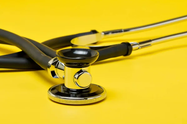 Stethoscope Close Isolated Yellow Background — Stock Photo, Image