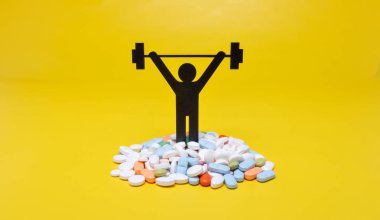 Halter piktogram hapları ve sarı arka plana sahip