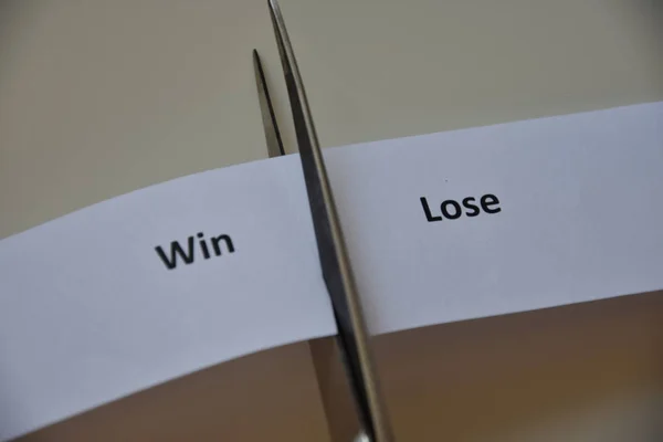 Win or lose decision on paper