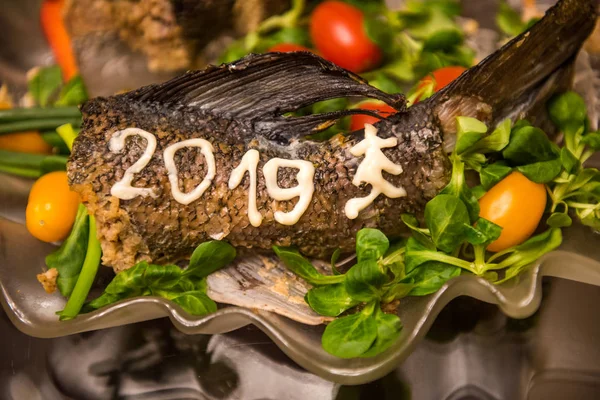 Stuffed sliced pike with mixed salad on new year table — Stock Image Stuffed Sliced Pike Mixed Salad New Year Table Stock Picture