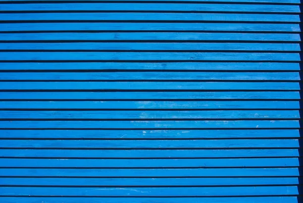 Голубая стена из тонких досок фона или текстуры — стоковое фото