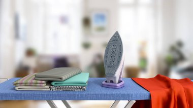 Ütü Masası yakınındaki s ütülenmiş şeyler üzerinde modern demir