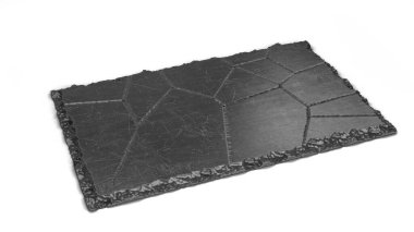 Lokantada yemek servisi için tek bir siyah taş tabak.