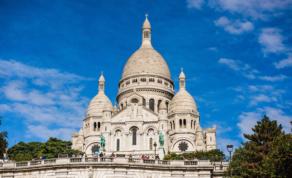 Sacre Coeur Cathedral on Montmartre Hill in Paris, France