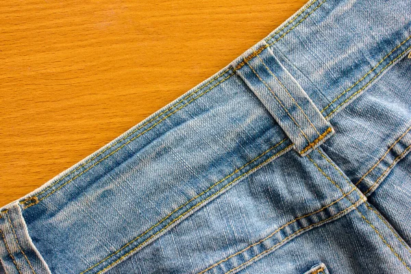 Textura Jeans Denim Vacío Sobre Fondo Madera —  Fotos de Stock