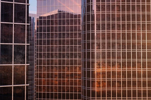 3D illustration Low angle view of skyscrapers. Skyscrapers at sunset looking up perspective. Bottom view of skyscrapers in business district in evening light or sunset. Business concept of success — Stock Photo, Image