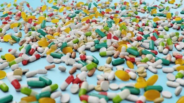 Wiele różnych kolorowych tabletek, kapsułki na niebieskim tle. Koncepcja opieki zdrowotnej. Antybiotyki w tabletkach, witaminy. Towar z apteki. Firma farmaceutyczna, przemysł, ilustracja 3D — Zdjęcie stockowe