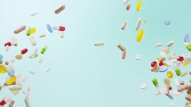 Yavaş çekim animasyonu, haplar uçarken birbirine çarpar. Çok renkli kapsüller ve haplar: antibiyotikler, vitaminler, diyet takviyeleri. Nüfus sağlığı konsepti, 4k 3D animasyon