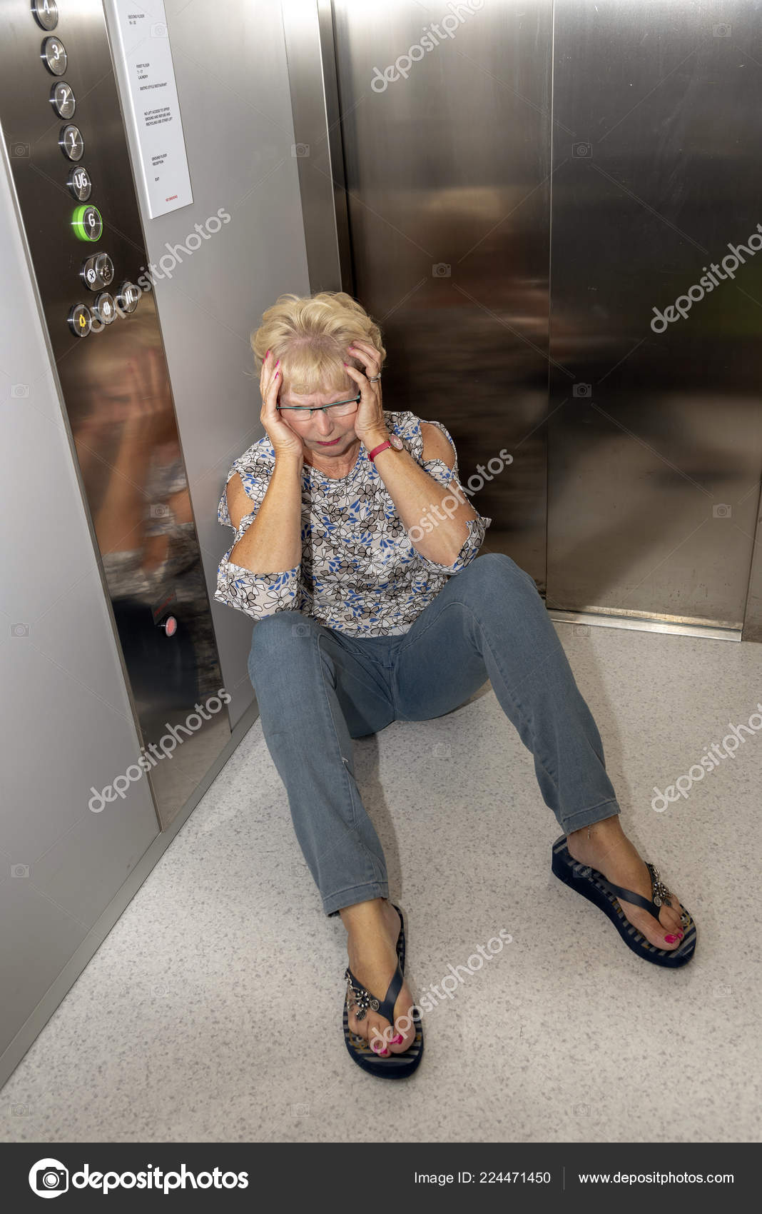 Elderly Woman Stuck Lift Sits Lift Floor Awaiting Help Rescue Stock Photo Image By C Petertt