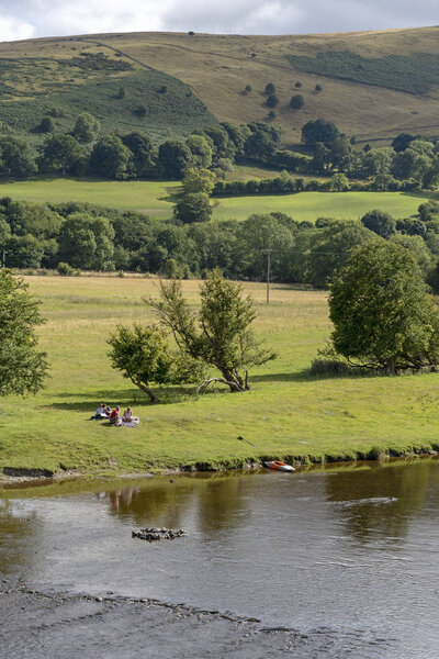 The River Dee at Carrog, Denbighshire, North Wales, Scenic location on the riverside looking southern farmland.
