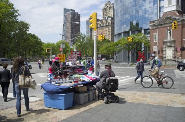 Güney Ferry Manhattan New York ABD mobilty scooter üzerinde sokak satıcısı
