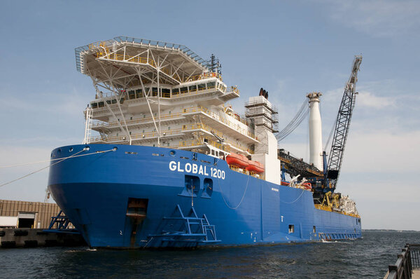 Global 1200 Most modern ship of its kind in the world. For use in the oil & gas industry for fabricating pipe and laying on the ocean floor seen here in the Port of Pensacola deep water facility Florida USA before departing at the end of May 2012. It