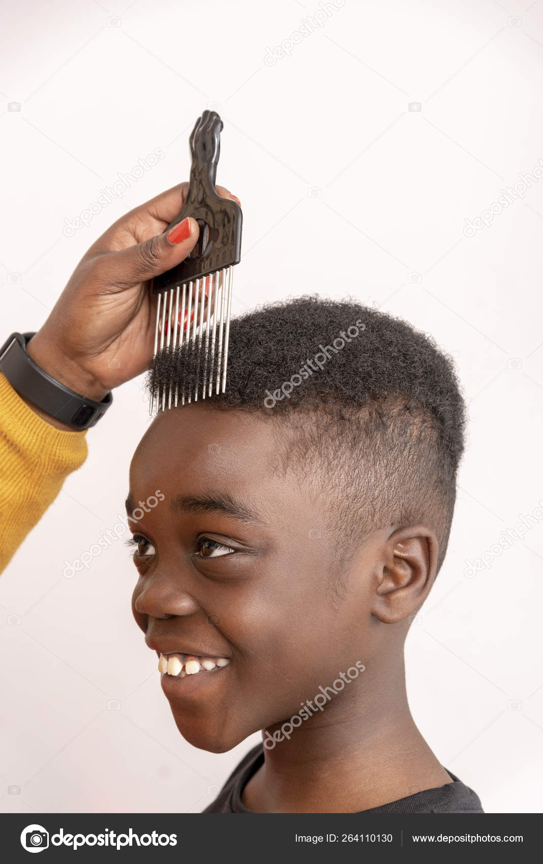 Nine Year Old Boy Curly Hair Holding Wide Tooth Afro Stock Photo by ©petertt 264110130 Nine Year Old Boy Curly Hair Holding Wide Tooth Afro Stock Photo by ©petertt 264110130