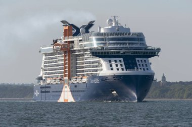 Southampton, England, UK. May 2019. The Celebrity Edge cruise ship underway on Southampton Water clipart