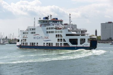 Portsmouth Harbour, England, UK. May 2019. The St. Clare a roro Isle of Wight ferry departing Portsmouth for the island. clipart