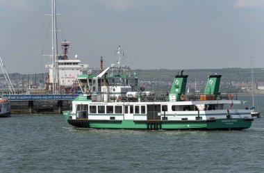 Portsmouth, England, UK. May 2019. The Gosport passenger ferry, Harbour Spirit underway and approaching Gosport crossing Portsmouth Harbour.