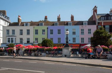 Margate, Kent, England UK. 2020. Old town Margate with colourful housing, cafes and floral decoration. clipart