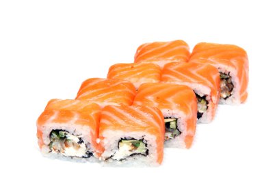 Tokyo rulo. Suşi somon balığı, yılanbalığı, ihale peynir ile. Japon mutfağının güzel bir yemek üzerinde. Diyet gıda.