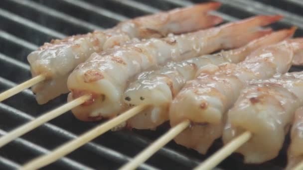 Macro shot of a frying shrimps — Stock Video